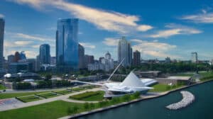 Aerial View Of Downtown Milwaukee With The Milwaukee Art Museum Prominently Featured Along The Shoreline Of Lake Michigan.